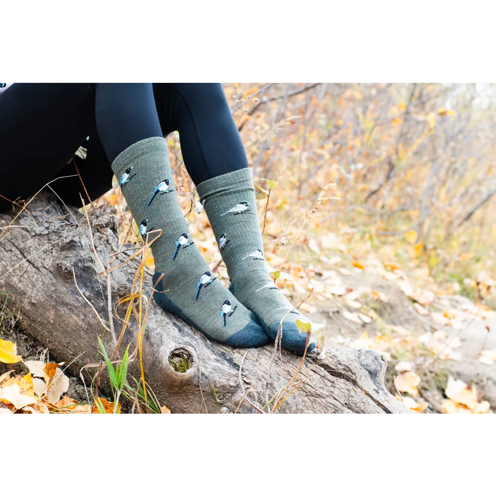 Green merino wool socks with mountain design for women