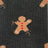 Dark gray merino wool socks with tan gingerbread man and red maple leaf details for cozy outdoor wear