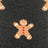 Women’s cozy outdoor merino wool socks with a tan knitted gingerbread man design and red star buttons on dark gray