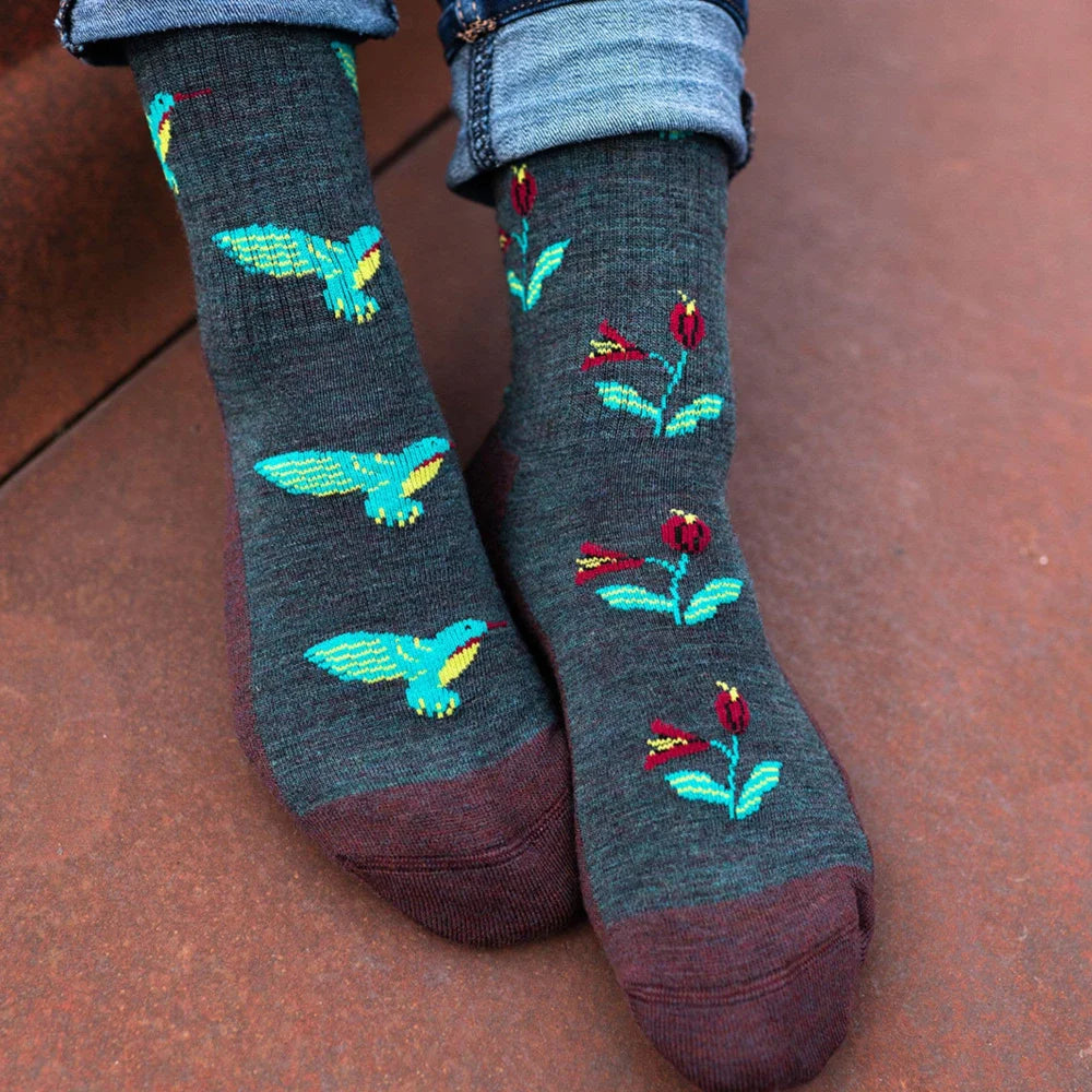 Dark gray women’s merino wool socks with turquoise and yellow hummingbird embroidery and maroon toe caps