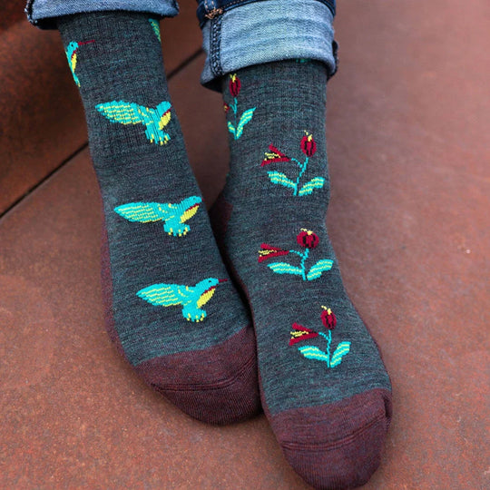 Dark gray women’s merino wool socks with turquoise and yellow hummingbird embroidery and maroon toe caps
