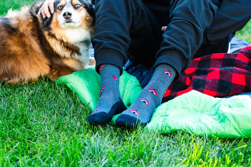 Women’s gray merino wool socks with red umbrella patterns and black toe caps, soft and adventure-ready merino wool socks
