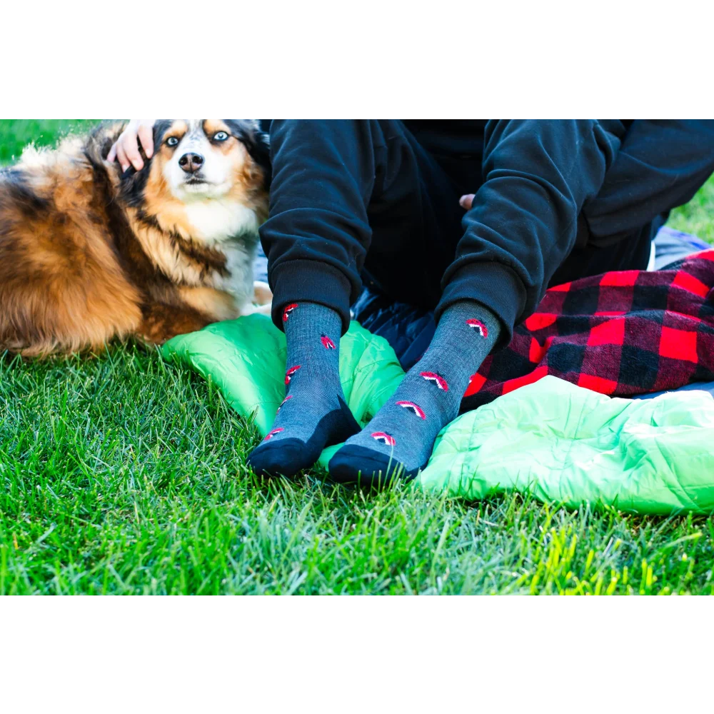 Women’s gray merino wool socks with red umbrella patterns and black toe caps, soft and adventure-ready merino wool socks