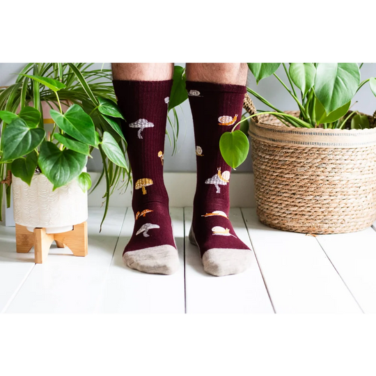 Women’s maroon merino wool socks with embroidered mushrooms and snails ribbed texture and beige toes for hiking