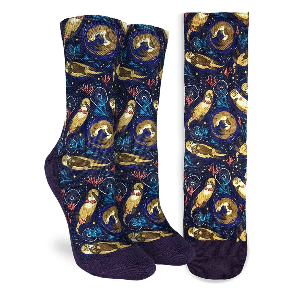 Angus Oliver peacock socks with purple toes on sheepskin rug
