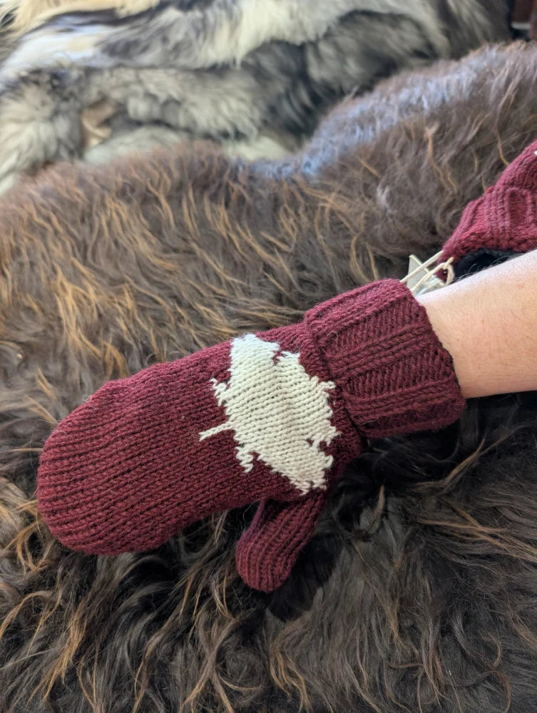 Cozy maroon wool maple ice mittens with white leaf design, true Canadian style