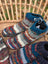 Cozy woolen adult sized booties in swool stripe wool with multicolored teal gray white and earthy tones stripes