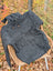 Dark gray textured knit calgary cardigan with attached hood wooden toggle pulls and ribbed cuffs made from zealand wool