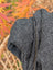 Cozy dark gray calgary cardigan with chunky knit pattern attached hood and gold-toned zipper made from zealand wool