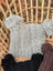 Gray woolen heelah double pompom double pompom hat with cable knit texture and fluffy side pom poms