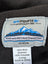 Gray woolen jasper vest label from ark imports showing soft fleece made with 100 percent new zealand wool