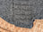 A chunky heather gray woolen solo ear flap hat with ribbed texture and visible stitch pattern