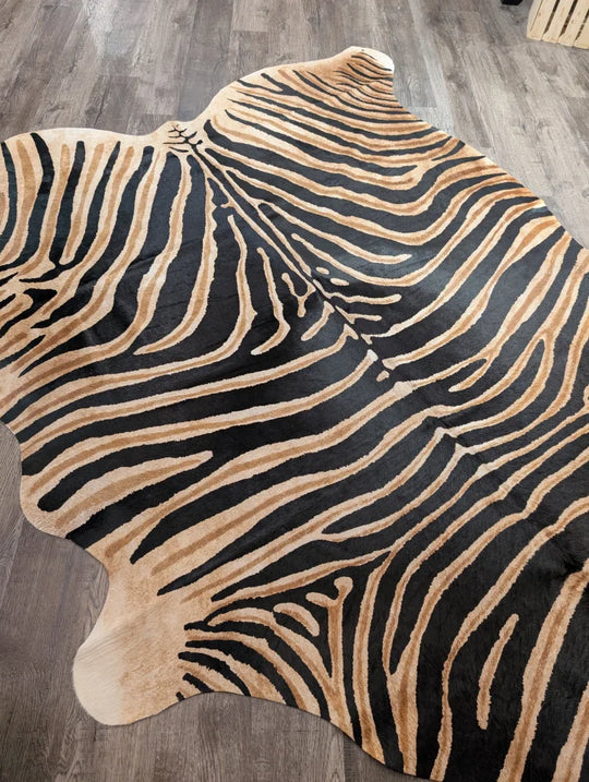 Gorgeous zebra printed cowhide in black and tan with natural fur texture showcasing unique characteristics by angus oliver