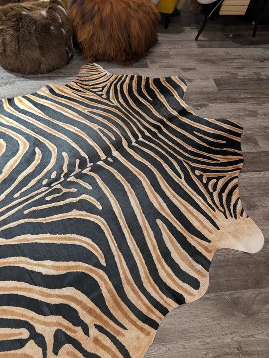 Black and tan zebra print large cowhide rug by angus oliver with unique characteristics for stylish decor