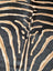 Gorgeous zebra printed cowhide rug by angus oliver with large cowhide and unique black and tan zebra print texture
