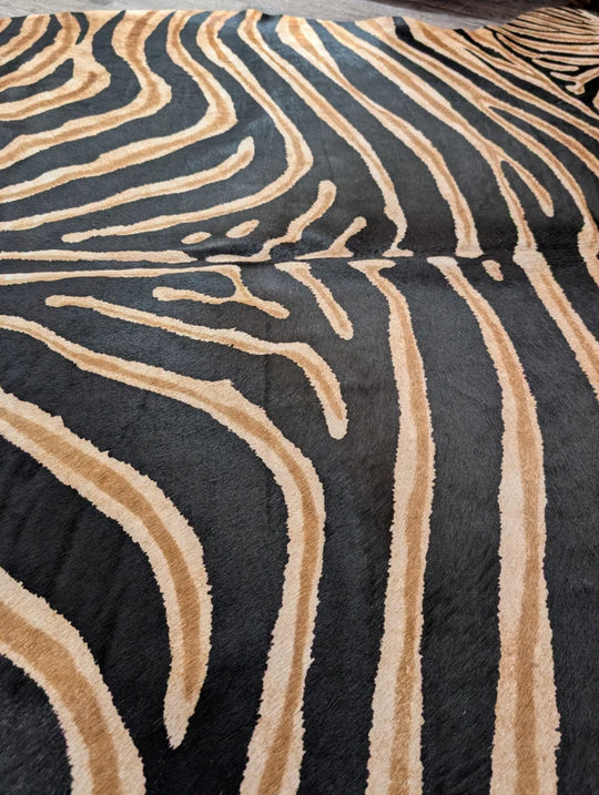 Gorgeous zebra printed cowhide rug with black and tan zebra stripes plush texture by angus oliver large cowhide with unique characteristics