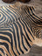 Gorgeous zebra printed cowhide angus oliver large cowhide with black and tan zebra print and unique characteristics