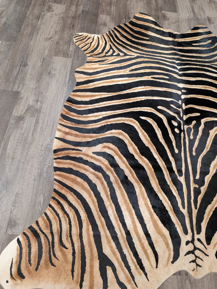 Gorgeous zebra printed large cowhide rug by angus oliver with black and tan zebra stripes and unique irregular edges