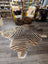 Gorgeous zebra printed large angus oliver cowhide rug with bold black and tan stripes and unique characteristics