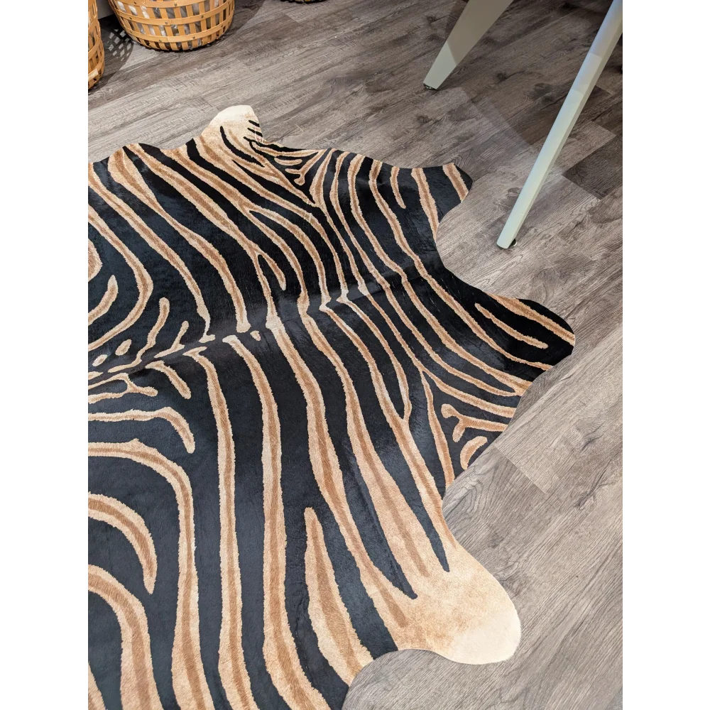 Black and tan zebra print large cowhide rug with unique textured faux leather surface by angus oliver