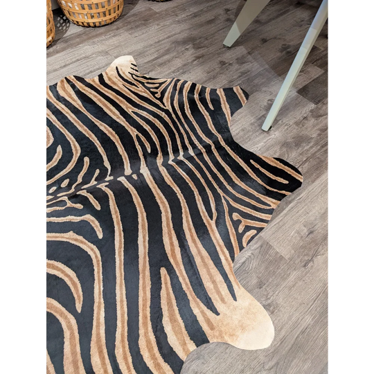 Black and tan zebra print large cowhide rug with unique textured faux leather surface by angus oliver