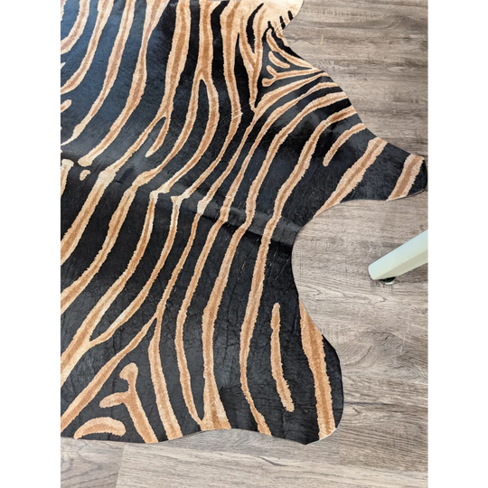 Black and tan zebra striped large cowhide rug by angus oliver with unique textured faux leather surface