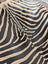 Black and tan zebra striped large cowhide rug by angus oliver with plush textured surface and unique characteristics